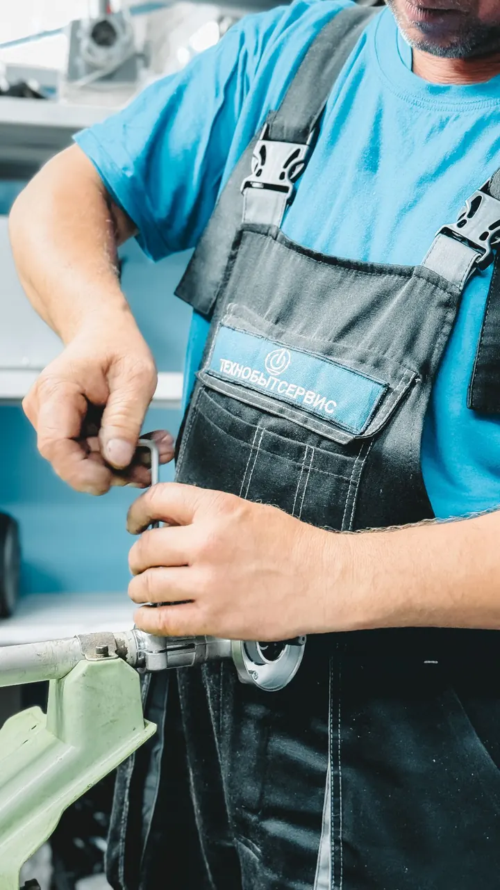 Plumber working on water heater piping, water heater installation Fort Myers